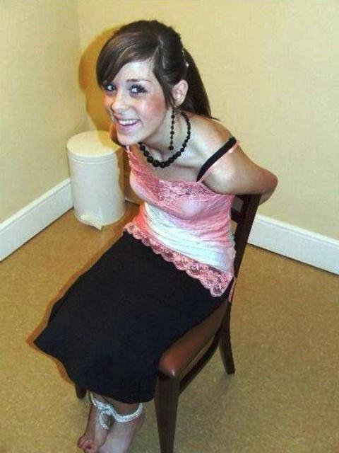 12P Cute school girl tied to a chair