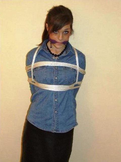 12P Cute school girl tied to a chair