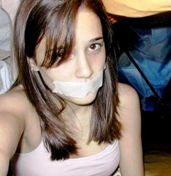 12P Cute school girl tied to a chair