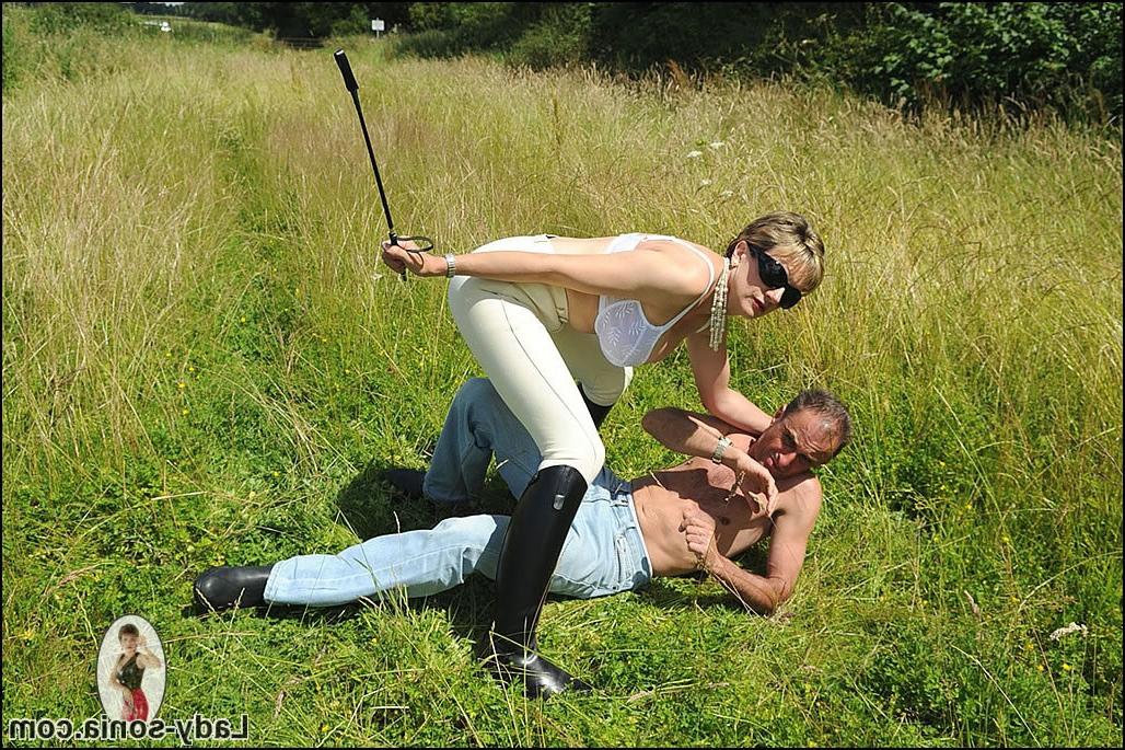 15P Busty equestrian domina outdoors trampling slave