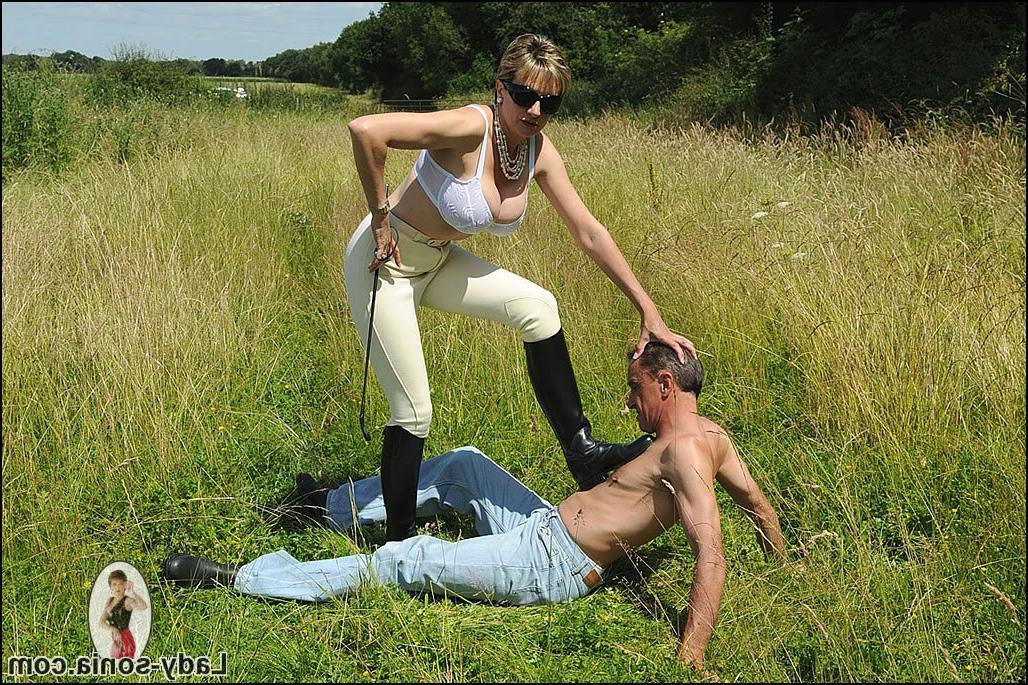 15P Busty equestrian domina outdoors trampling slave