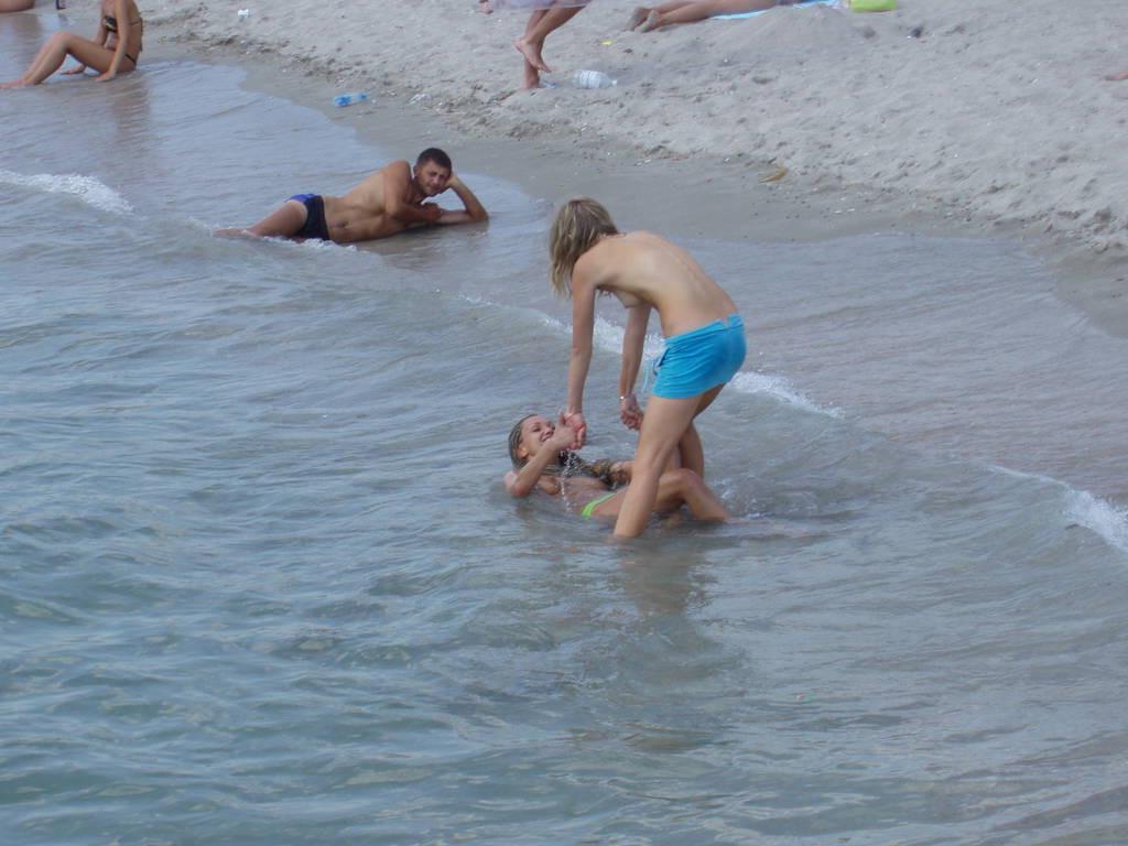 15P Perky breasted nude goddess poses on a nude beach