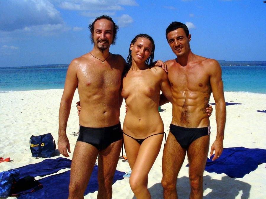 15P Perky breasted nude goddess poses on a nude beach