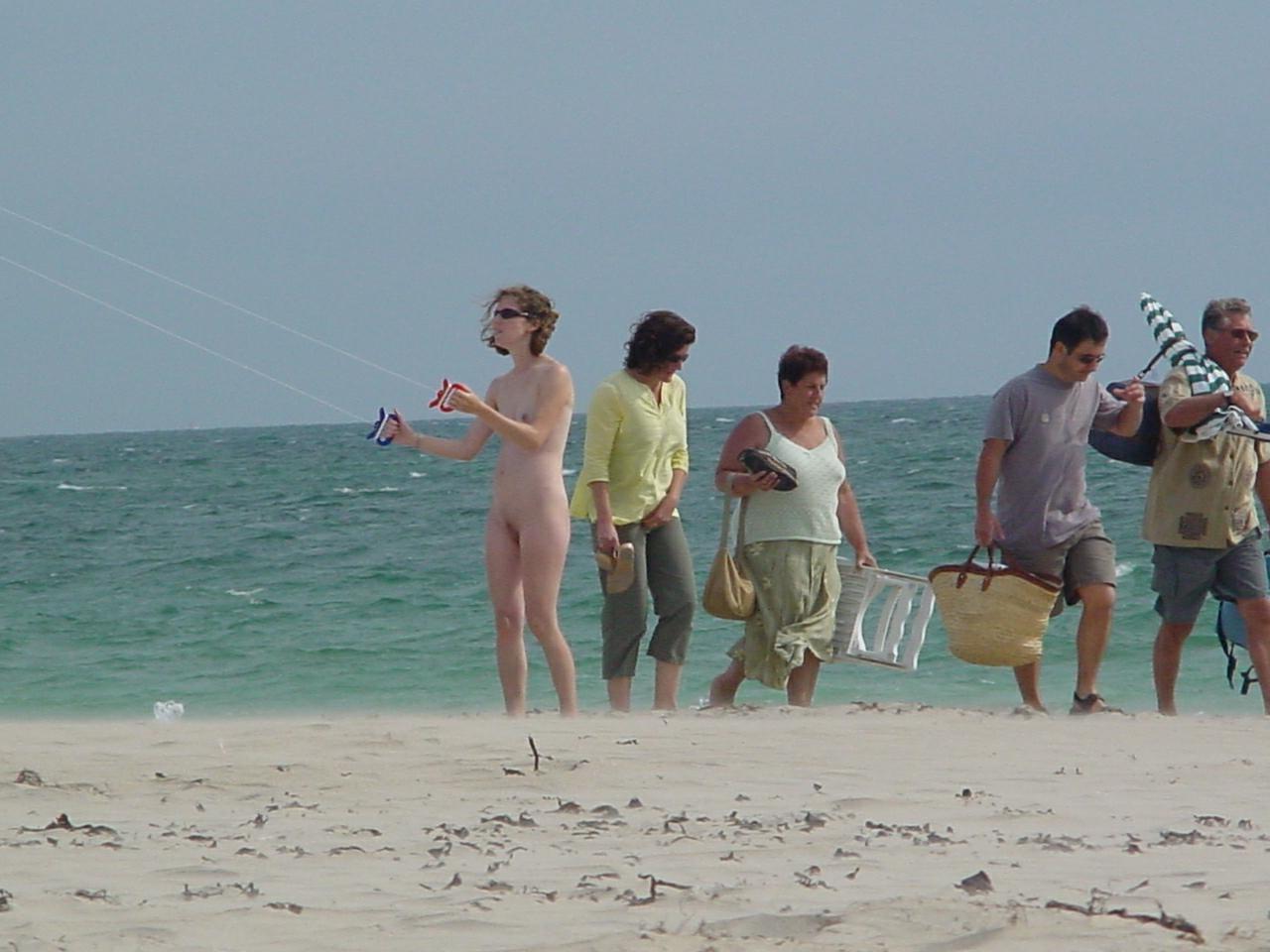 15P Watch these smooth nudists play at a public beach