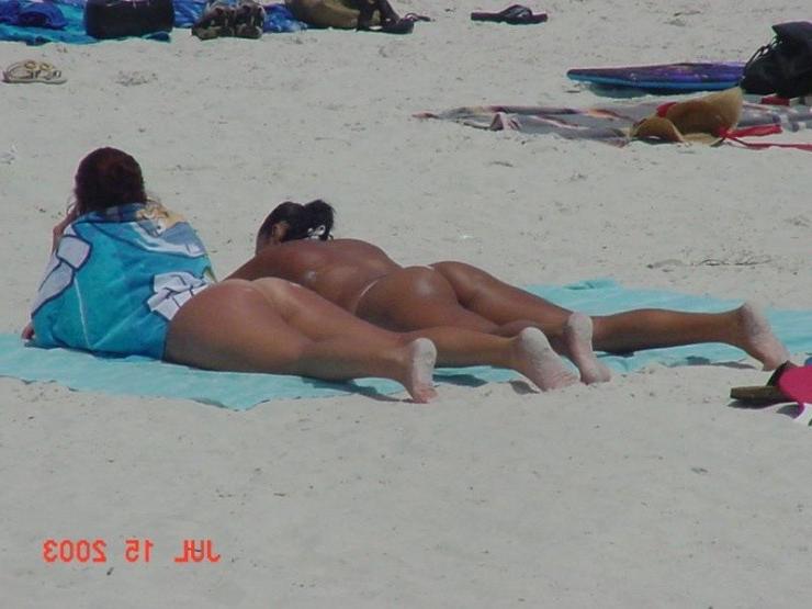 15P These two teen nudists play frisbee in the water