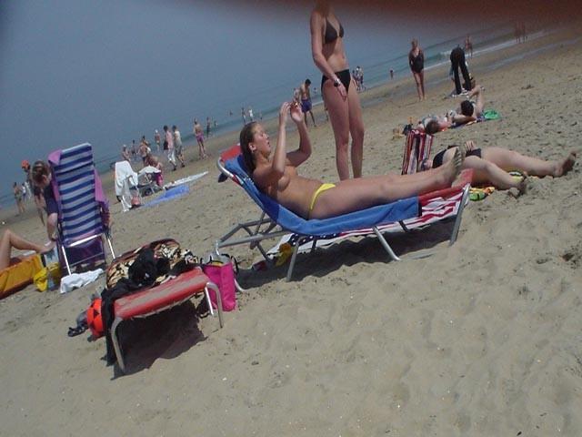 15P These two teen nudists play frisbee in the water