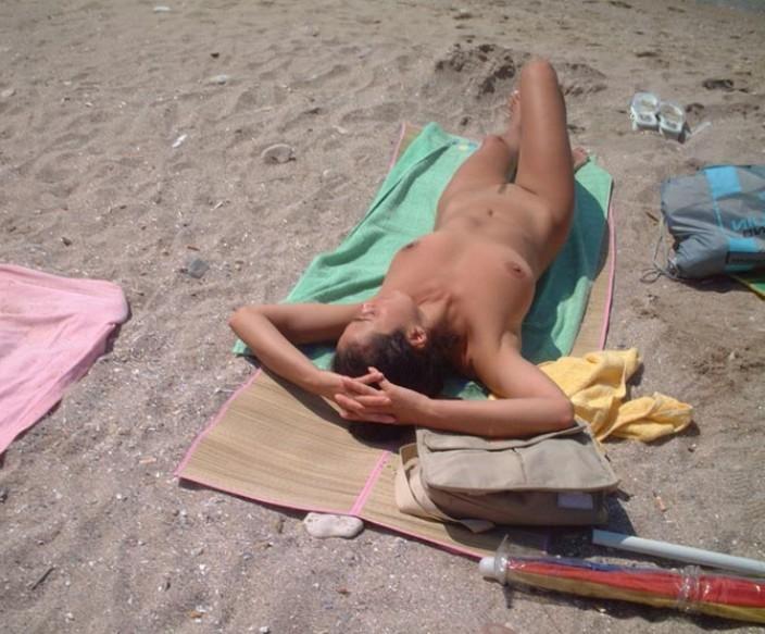15P These two teen nudists play frisbee in the water