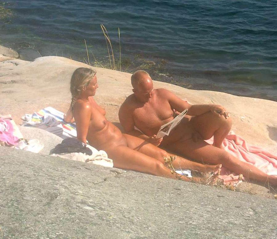 12P Naughty young nudists play with each other in sand
