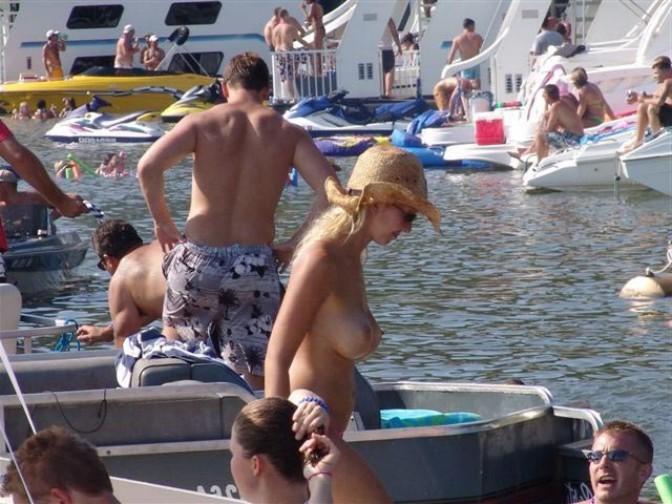 15P Perky breasted nude goddess poses on a nude beach