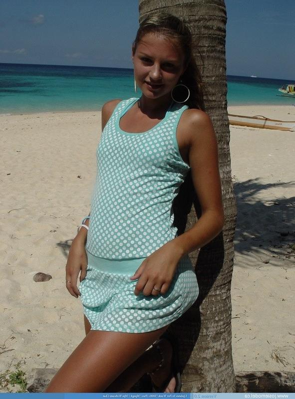 16P Topless teen at beach