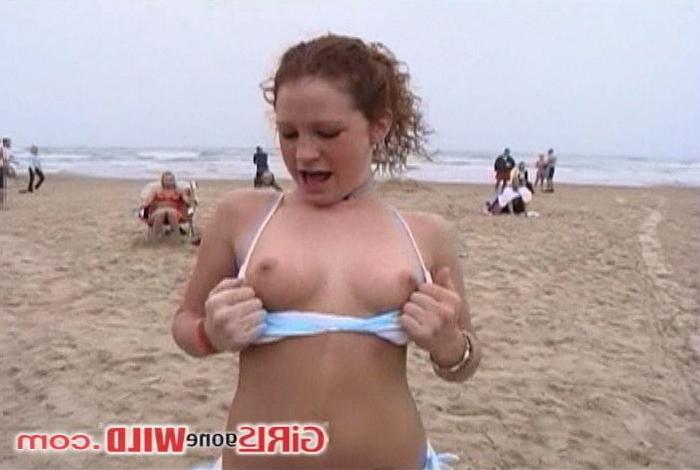 10P Young beach babe shows us her juggs