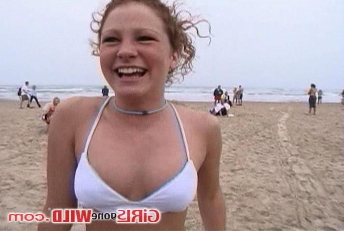 10P Young beach babe shows us her juggs