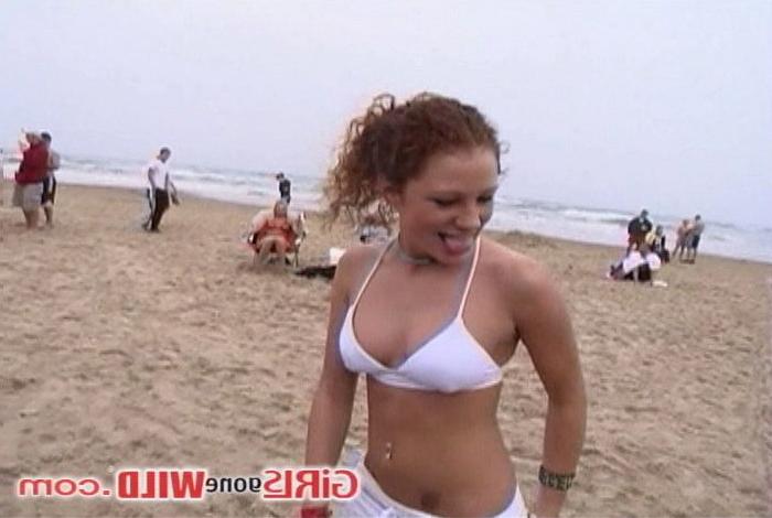 10P Young beach babe shows us her juggs