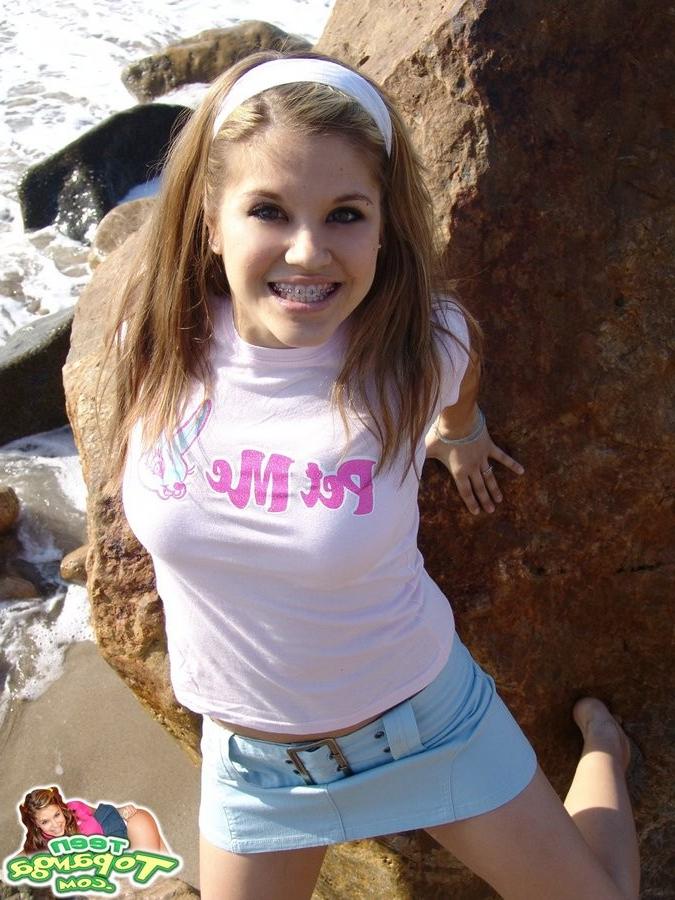 15P Cute Topanga posing outdoors on the rocks topless