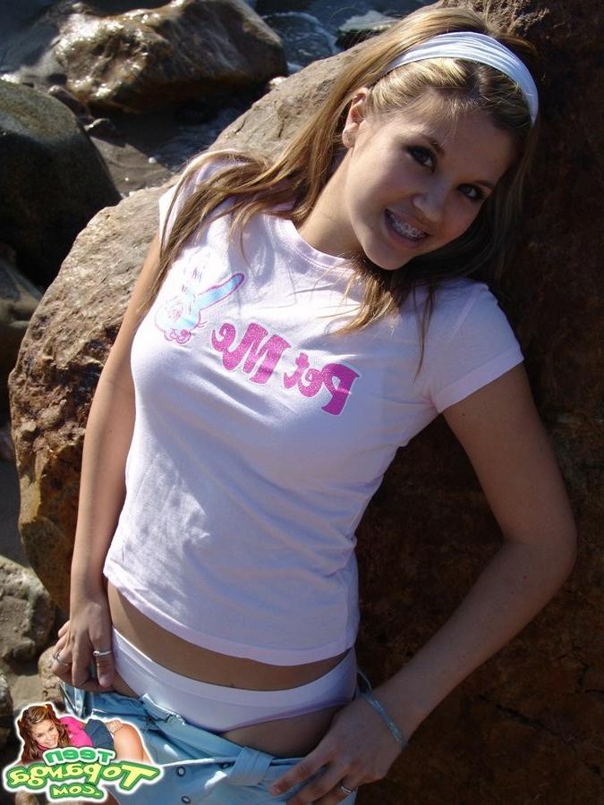 15P Cute Topanga posing outdoors on the rocks topless