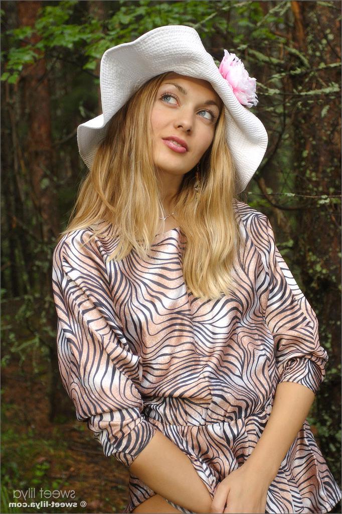 12P Hot and horny Russian teenager Lilya strips off her tiny skirt in the woods