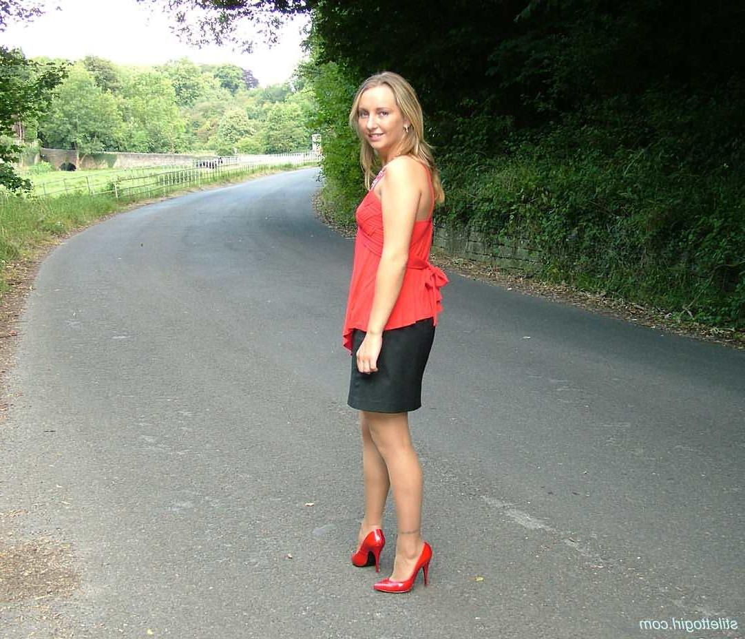 15P Stiletto girl in stockings and red high heels