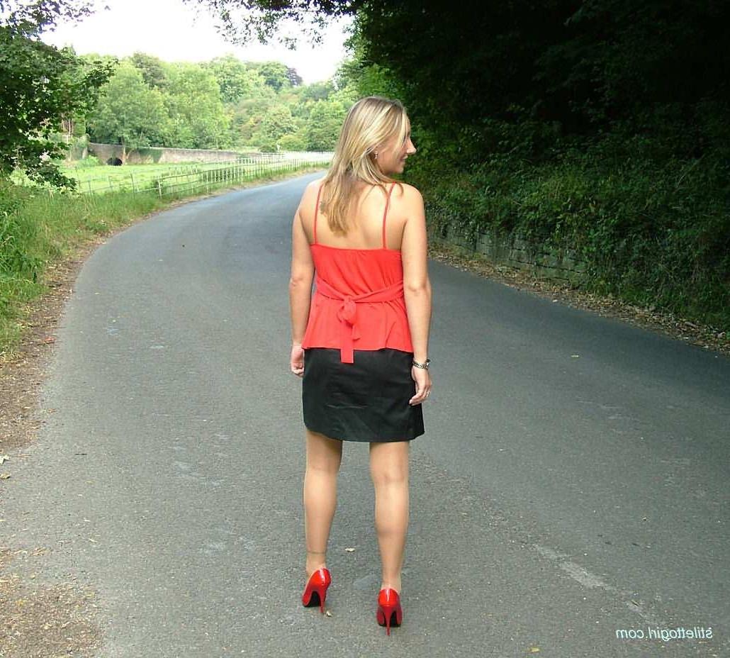 15P Stiletto girl in stockings and red high heels