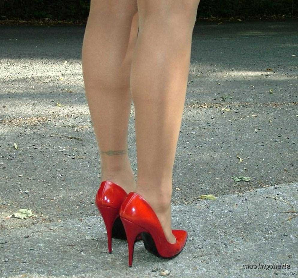 15P Stiletto girl in stockings and red high heels