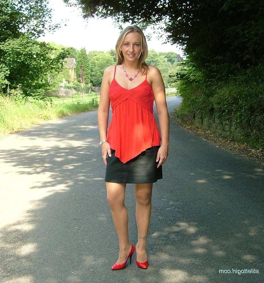 15P Stiletto girl in stockings and red high heels