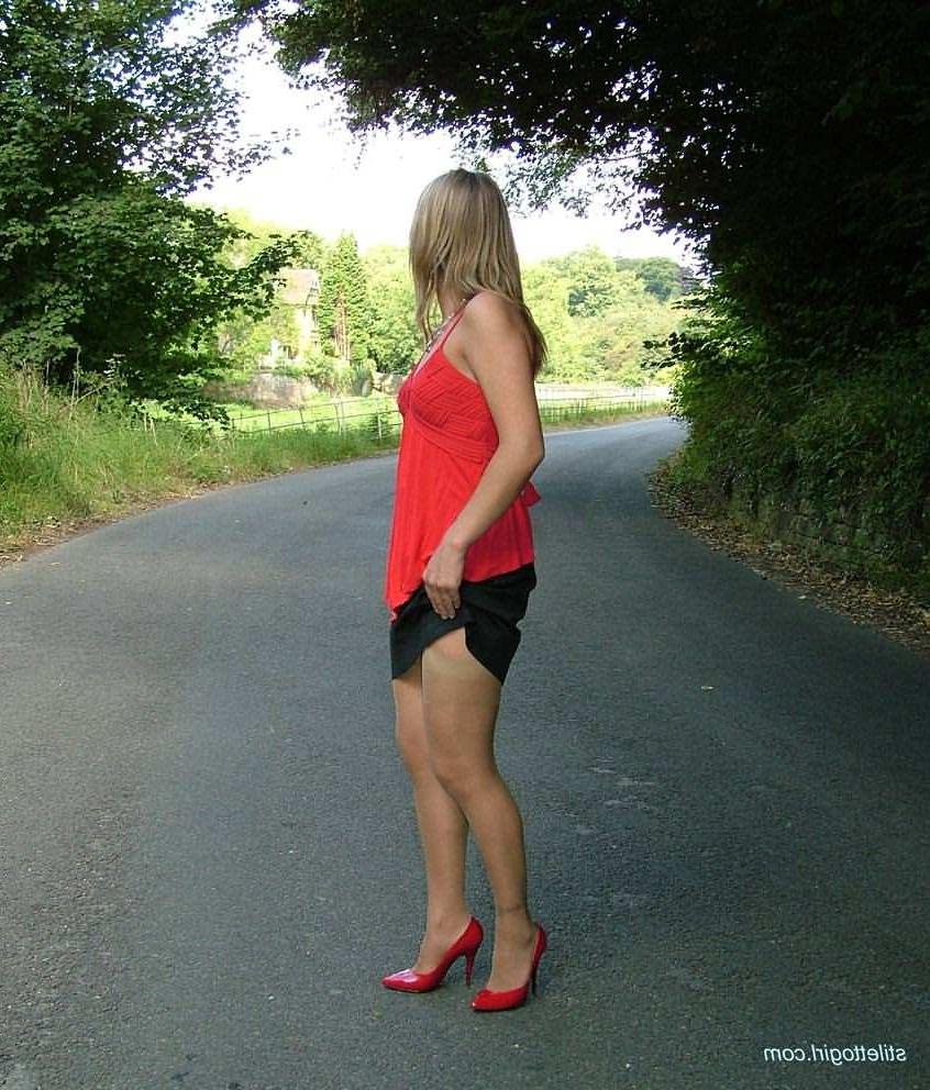 15P Stiletto girl in stockings and red high heels