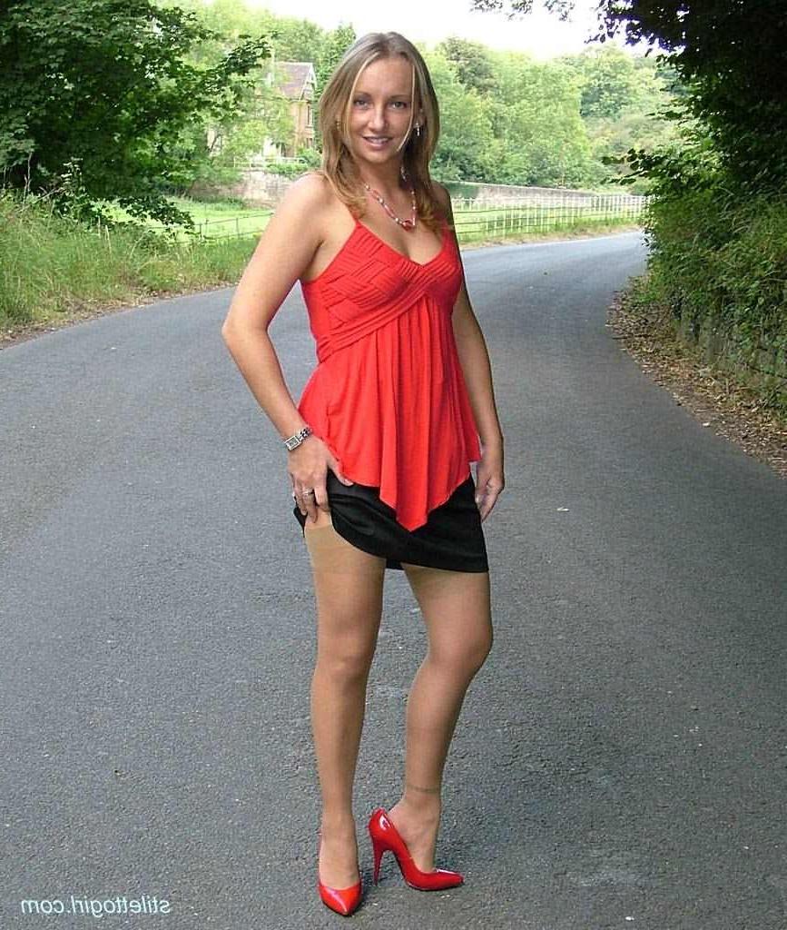 15P Stiletto girl in stockings and red high heels