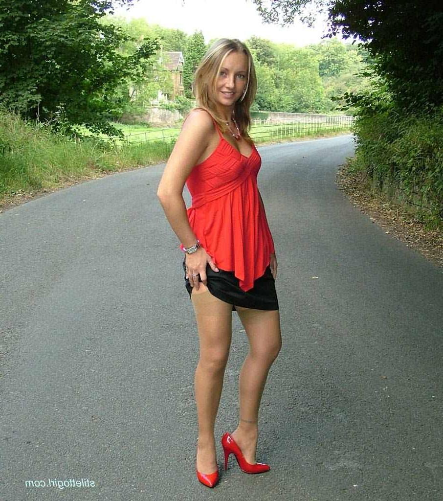 15P Stiletto girl in stockings and red high heels