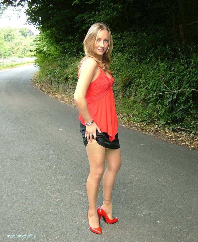 15P Stiletto girl in stockings and red high heels