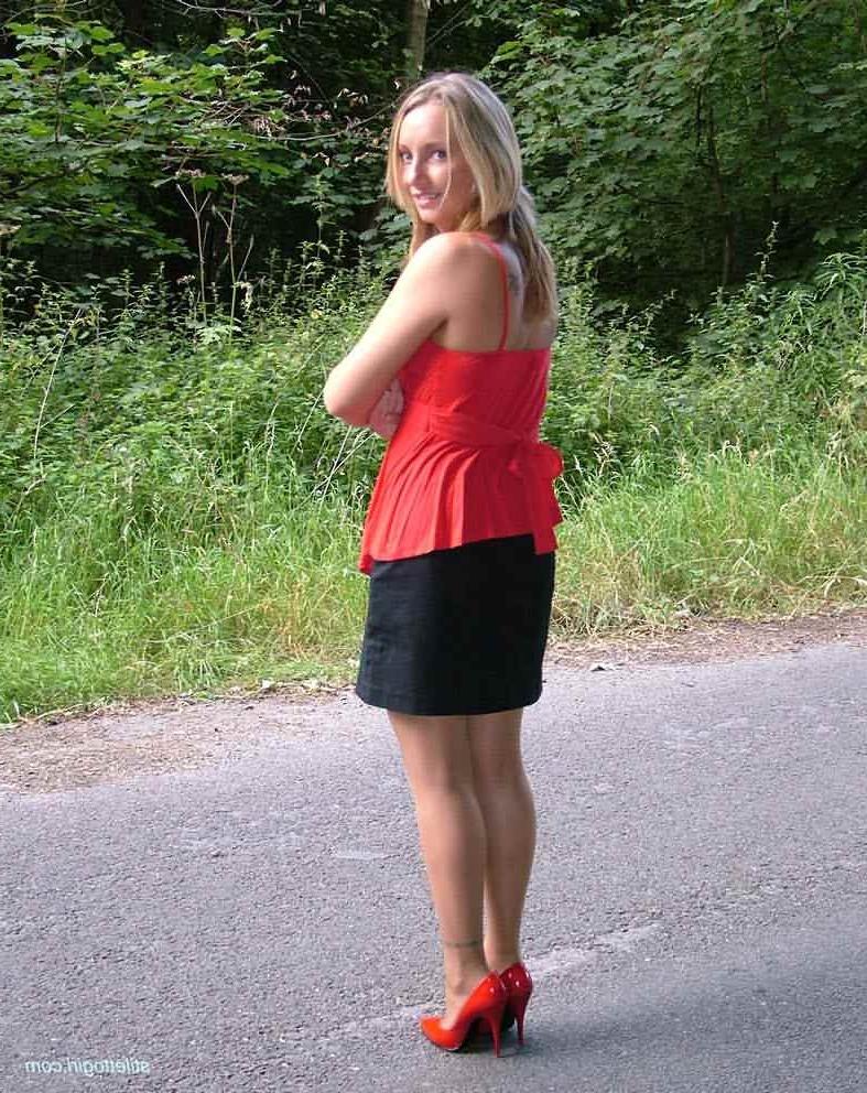 15P Stiletto girl in stockings and red high heels