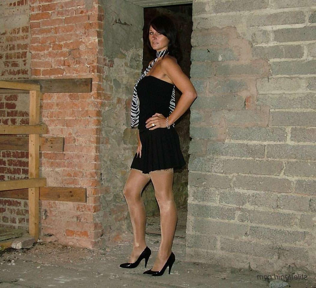 15P Shapely legs in black high heels and stockings