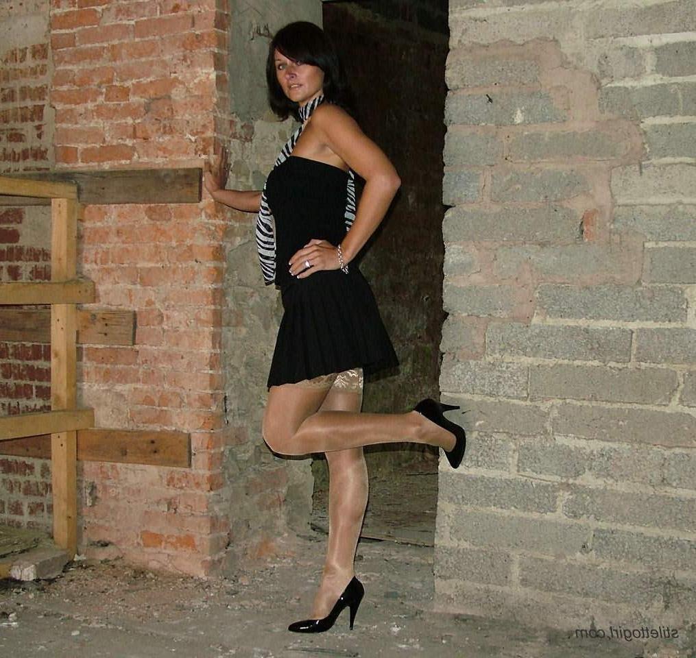 15P Shapely legs in black high heels and stockings