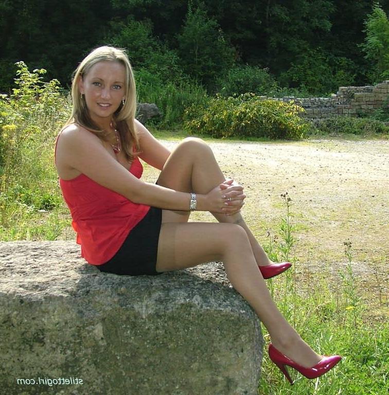 15P Stiletto girl in stockings and red high heels