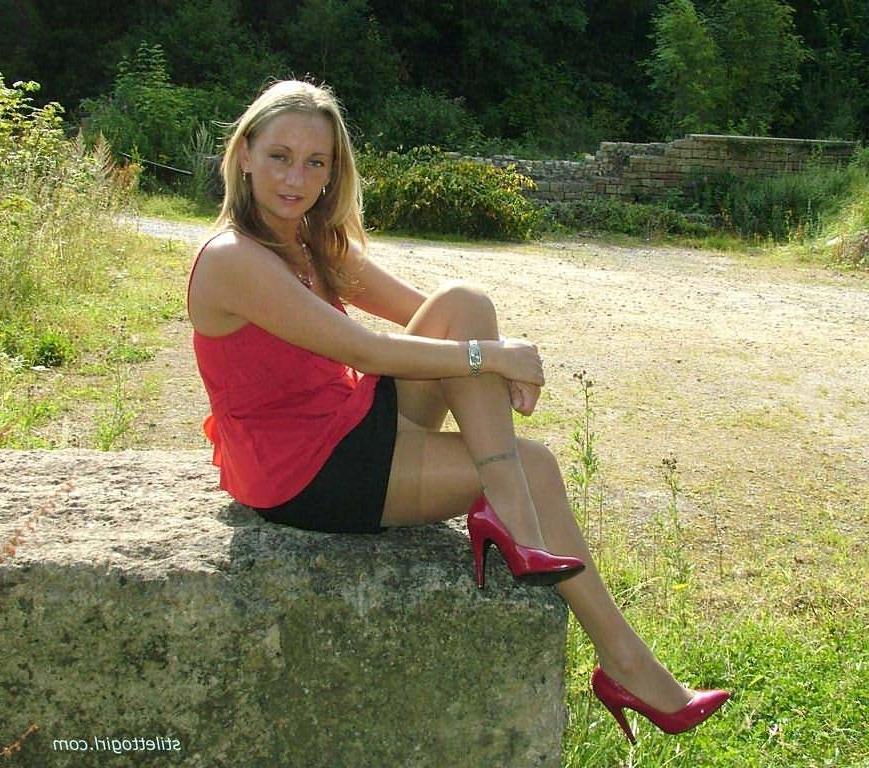 15P Stiletto girl in stockings and red high heels