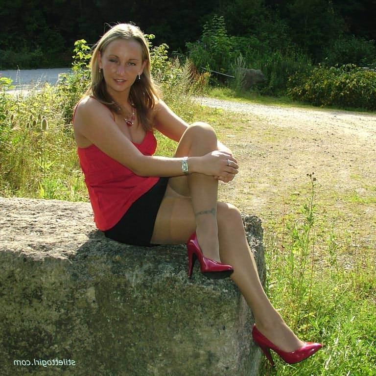 15P Stiletto girl in stockings and red high heels