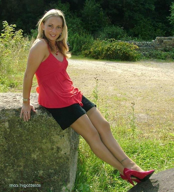 15P Stiletto girl in stockings and red high heels