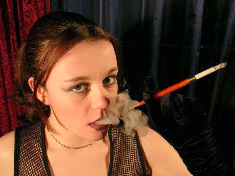 16P Cute sexy brunette teen smoke  a long cigarette sensual way