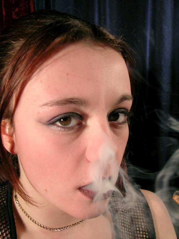 16P Cute sexy brunette teen smoke  a long cigarette sensual way