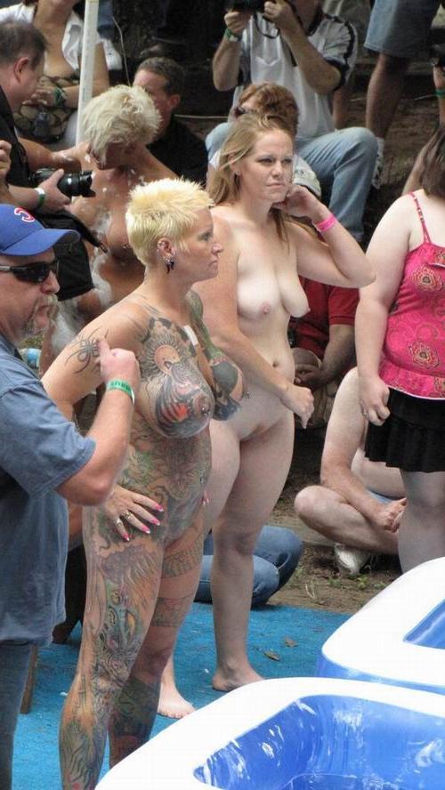 16P busty tattoed and pierced mature poser on the public