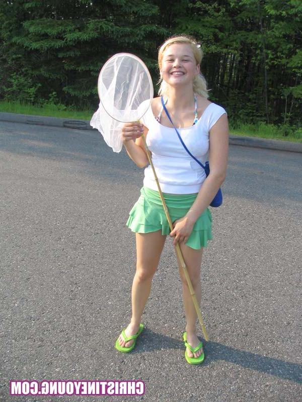 15P Blonde cutie flashing her boobs and having fun outdoors