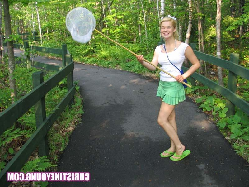 15P Blonde cutie flashing her boobs and having fun outdoors