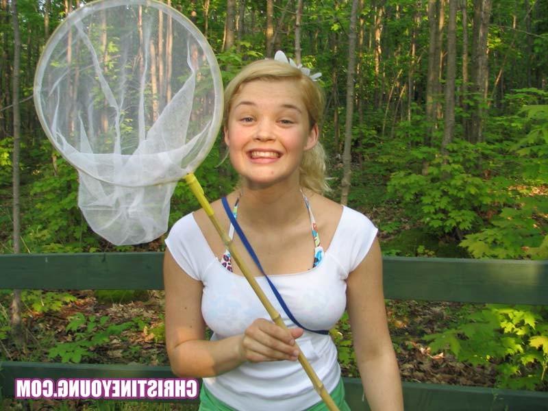 15P Blonde cutie flashing her boobs and having fun outdoors