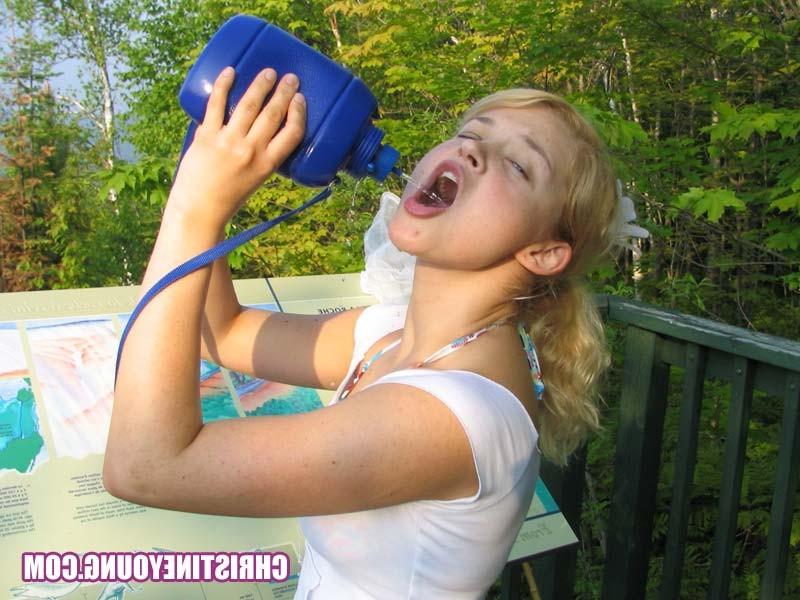15P Blonde cutie flashing her boobs and having fun outdoors