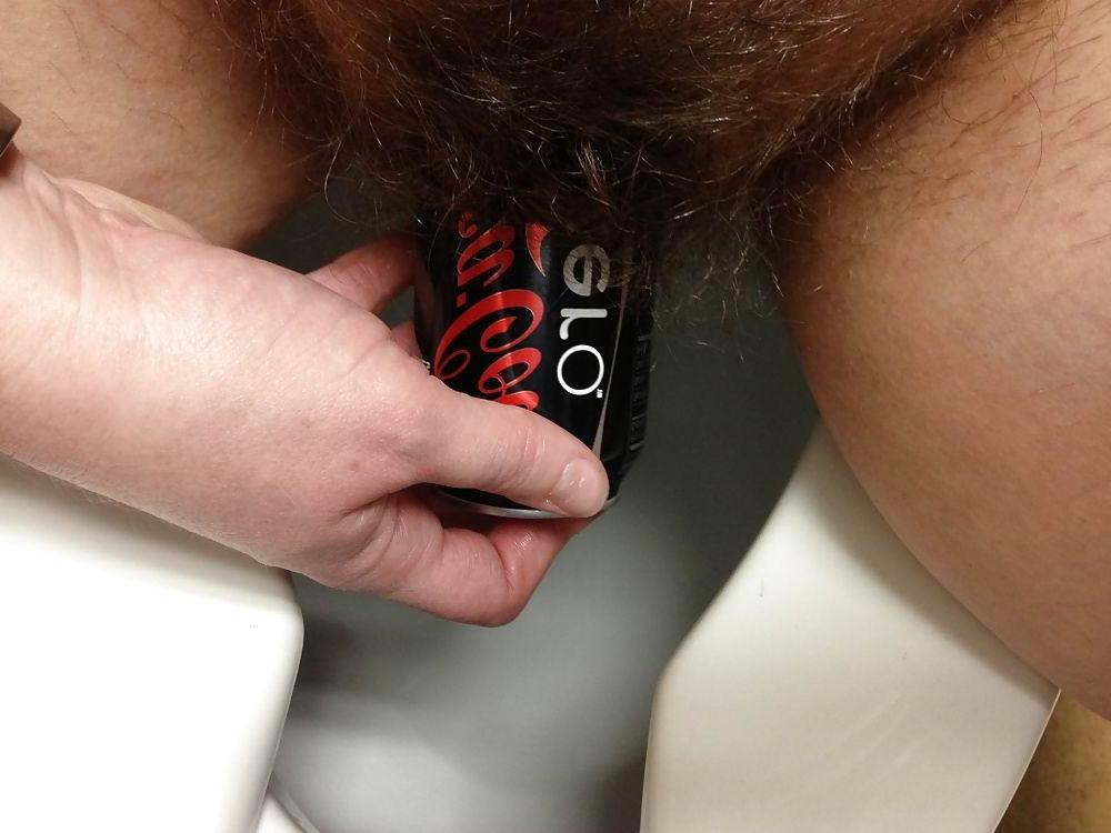 16P Fat hairy pussy stuffed with coke can