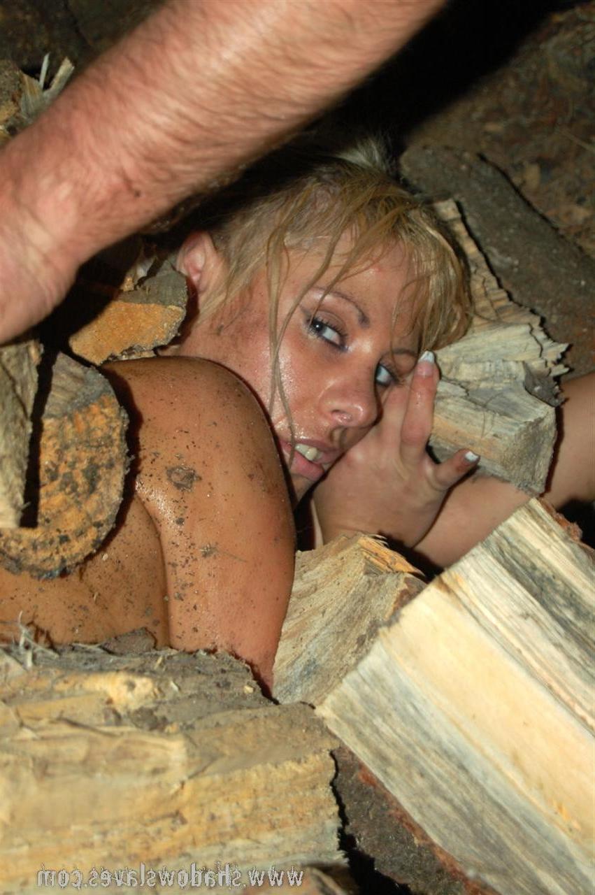 15P Filthy slave labour of blonde subbie chopping wood