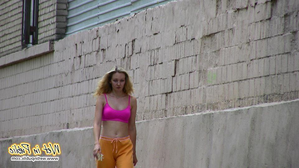 14P Blonde in sporty breeches and top shockingly wets herself on the street