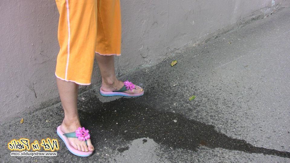 14P Blonde in sporty breeches and top shockingly wets herself on the street