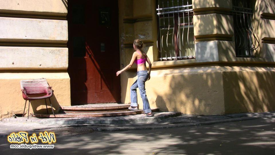 16P When this chick can't get in her house she just wets her jeans outdoors