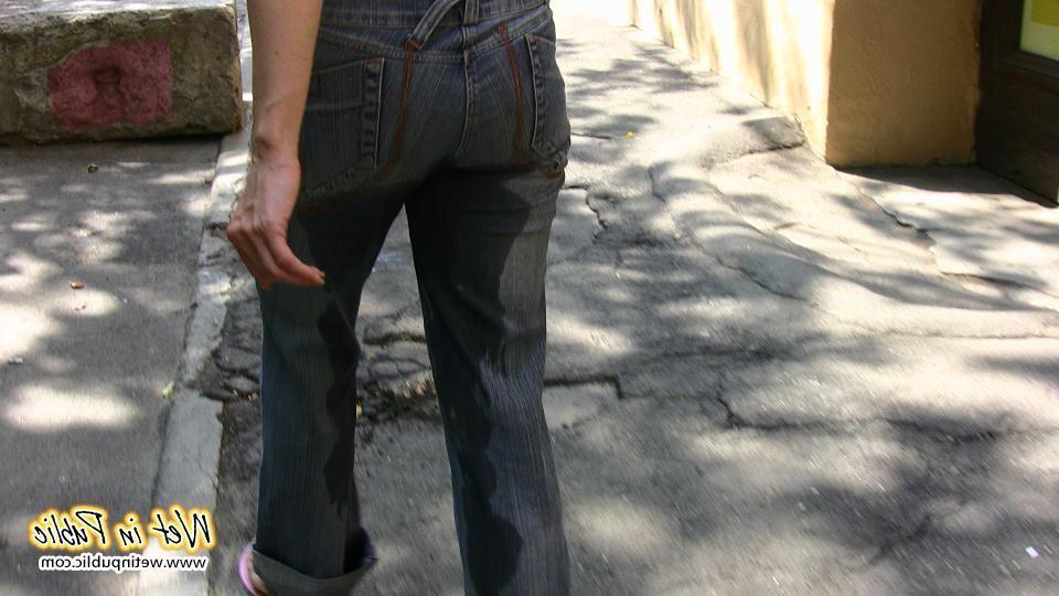 16P When this chick can't get in her house she just wets her jeans outdoors