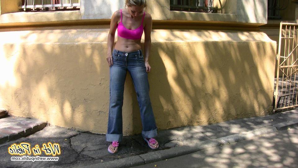 16P When this chick can't get in her house she just wets her jeans outdoors