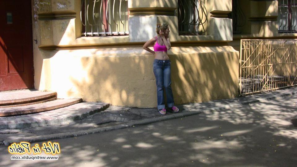 16P When this chick can't get in her house she just wets her jeans outdoors